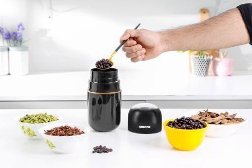 Effortlessly grind coffee and spices with the Coffee Grinder- 80 g Capacity, featuring a sleek design and ergonomic grip.